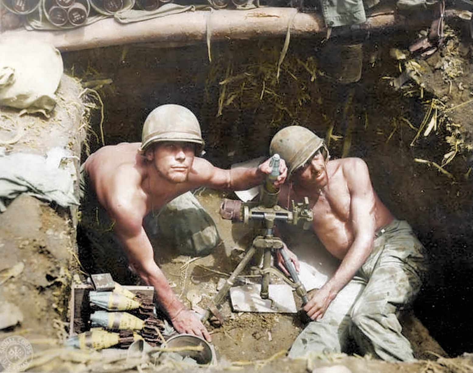 Marines firing mortar shells in the Solomon Islands.