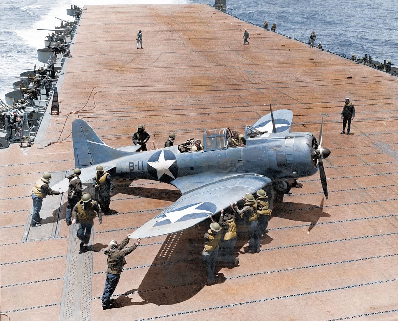 A US Navy Douglas SBD-3 Dauntless of bombing squadron VB-8 on the deck of the aircraft carrier USS Hornet (CV-8) during the Battle of Midway in 1942.