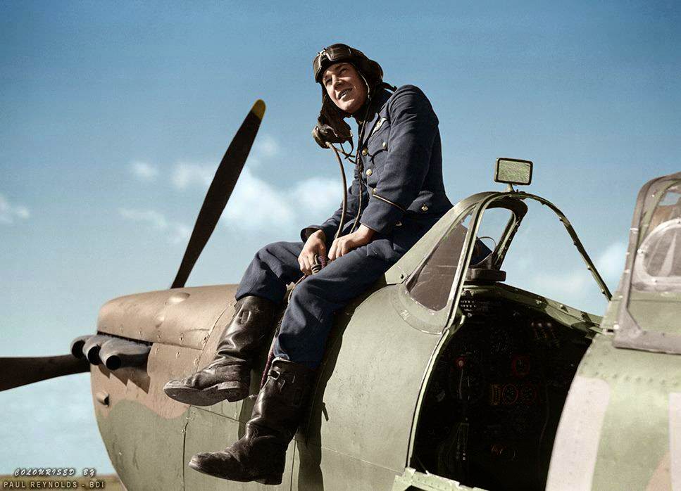 Flying Officer Leonard Haines of No. 19 Squadron RAF sits by the cockpit of his Supermarine Spitfire Mk.Ia (QV-?) at Fowlmere, near Duxford. September 1940