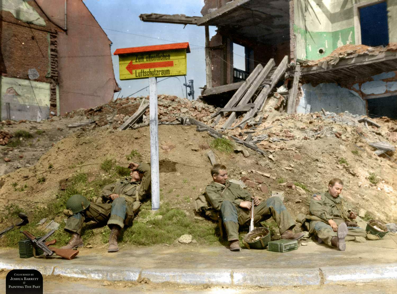 Three troopers of the 507th Parachute Infantry Regiment, 17th Airborne Division taking a break after 5 days frontline fighting. From left to right : Pvt William H. Sandy (ASN 13032007) from Charlottesville, VA, Sgt Dehaven Nowlin (ASN 15046241) from Goshen, KY and Pvt Howard Fredericks (ASN 39241668