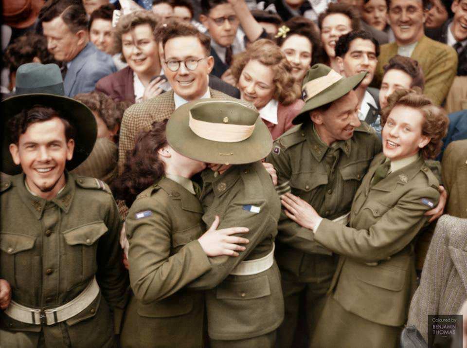 Australian soldiers mingle with a section of the crowd gathered in Martin Place during the Victory in the Pacific celebrations, Sydney, 15 August 1945