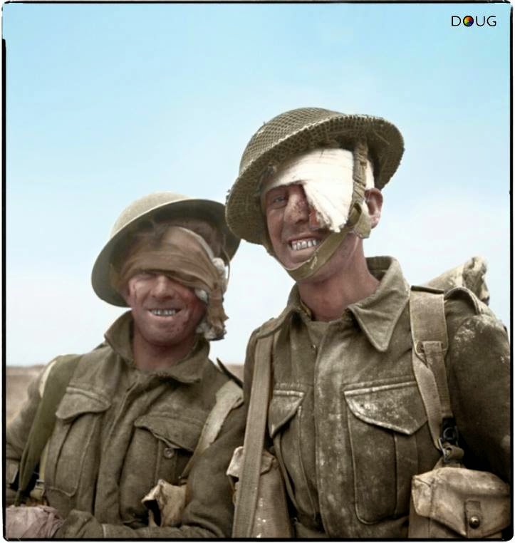 Two wounded soldiers from the 6th Durham Light Infantry, 50th (Northumbrian) Infantry Division, XXX Corps., during the Mareth line battle, 22-24 March 1943