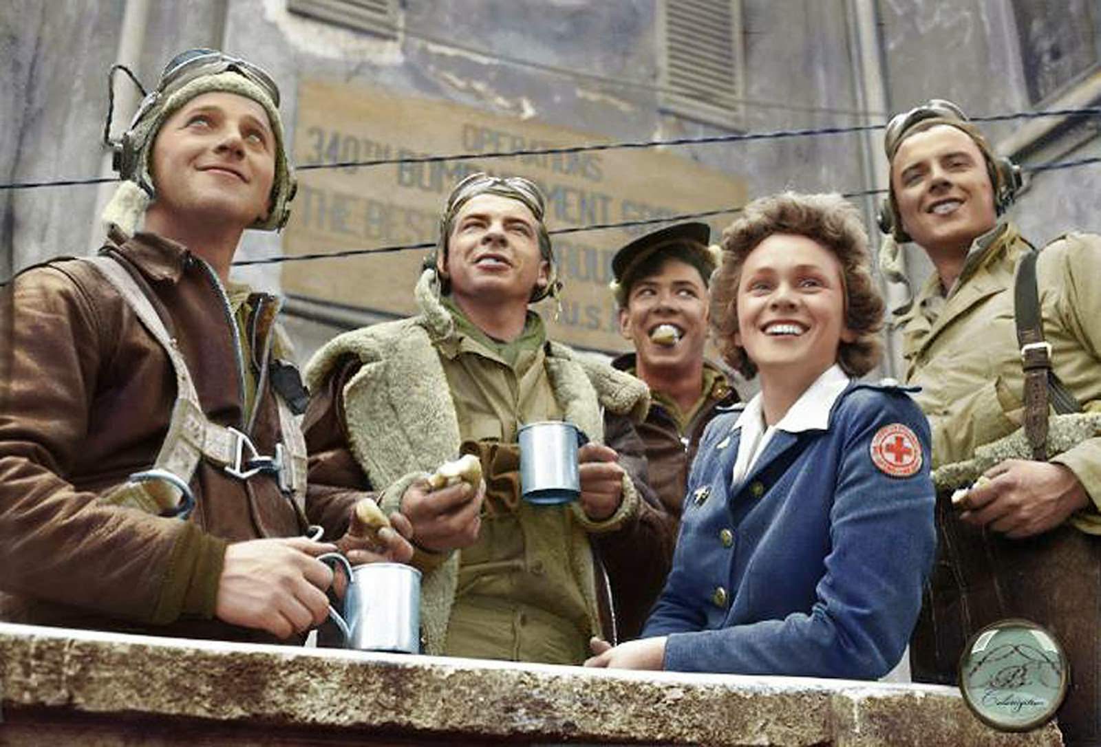 From Left to Right, B-25 crew members: Sgt. John C. Bellendir (Gnr.), Chicago; Sgt. Raymond J. Swingholm (Eng/Gnr.), Lebanon, PA; Sgt. Harris B. Pate (Rd/Gnr.), Hamlet, NC; Red Cross Clubmobile Worker, Peggy Steers from White Plains, NY. and T/Sgt. Aubrey Chatters (Rd/Gnr.), Milington MI. All from t