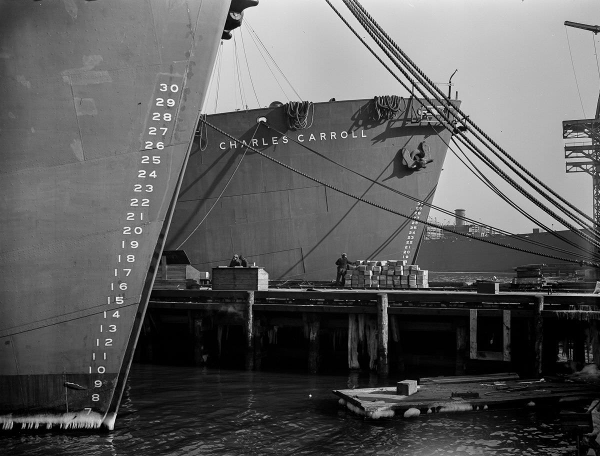 Liberty ships at anchor await final fitting and rigging