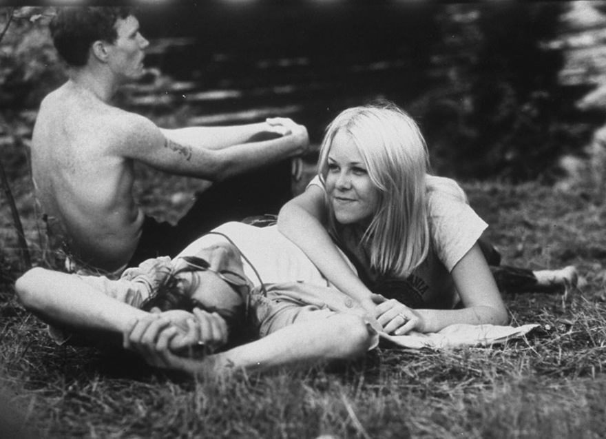 Young Couple Relaxing During Woodstock Music Festival