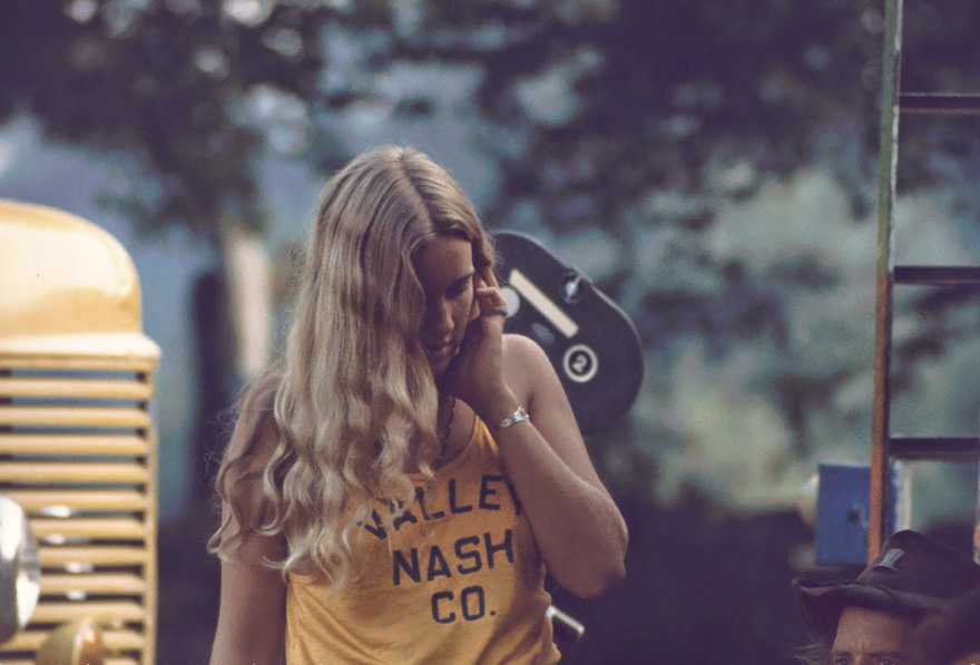 Blonde-Haired Woman Dances To Music From Free Stage