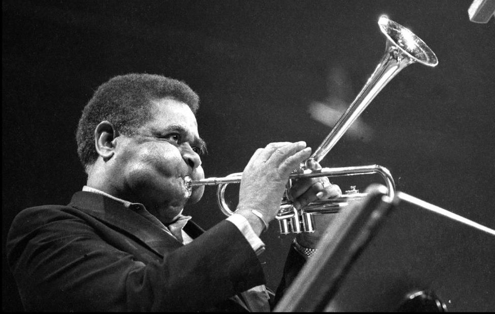 Dizzy Gillespie inflating cheeks