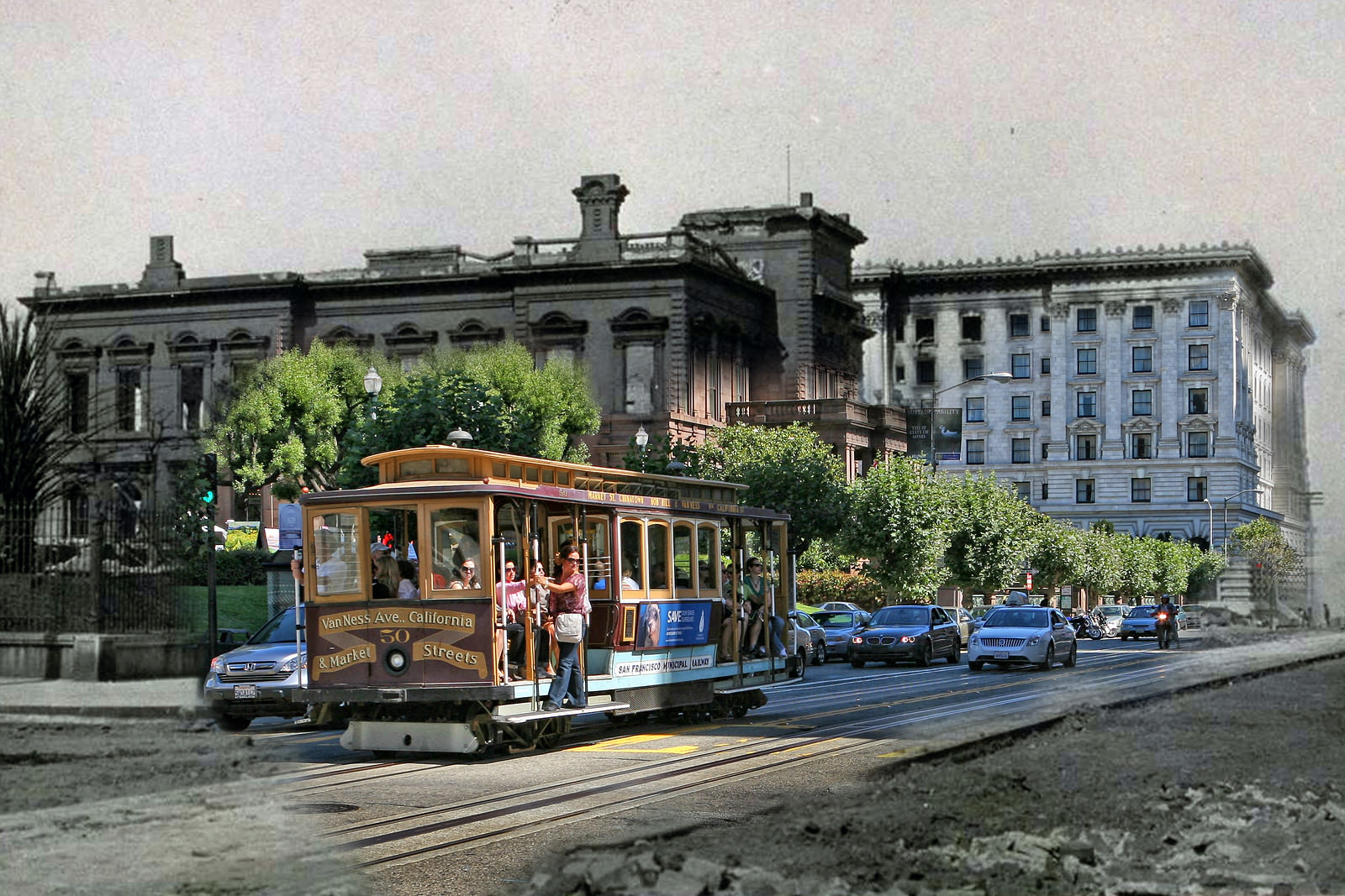 Passing cable cars offer a view of the destruction of California Street. Old St. Marys Cathedral has escaped destruction.