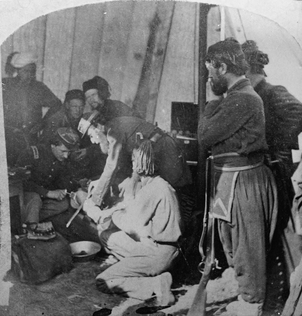 Army doctors performing an amputation in a make-shift hospital during the U.S. Civil War (1861-65), 1863.
