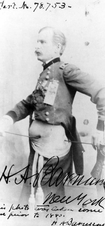 Major General Henry Barnum shows off his war wounds. Barnum was shot through the side in 1862 and later received a Medal of Honor for his leadership.