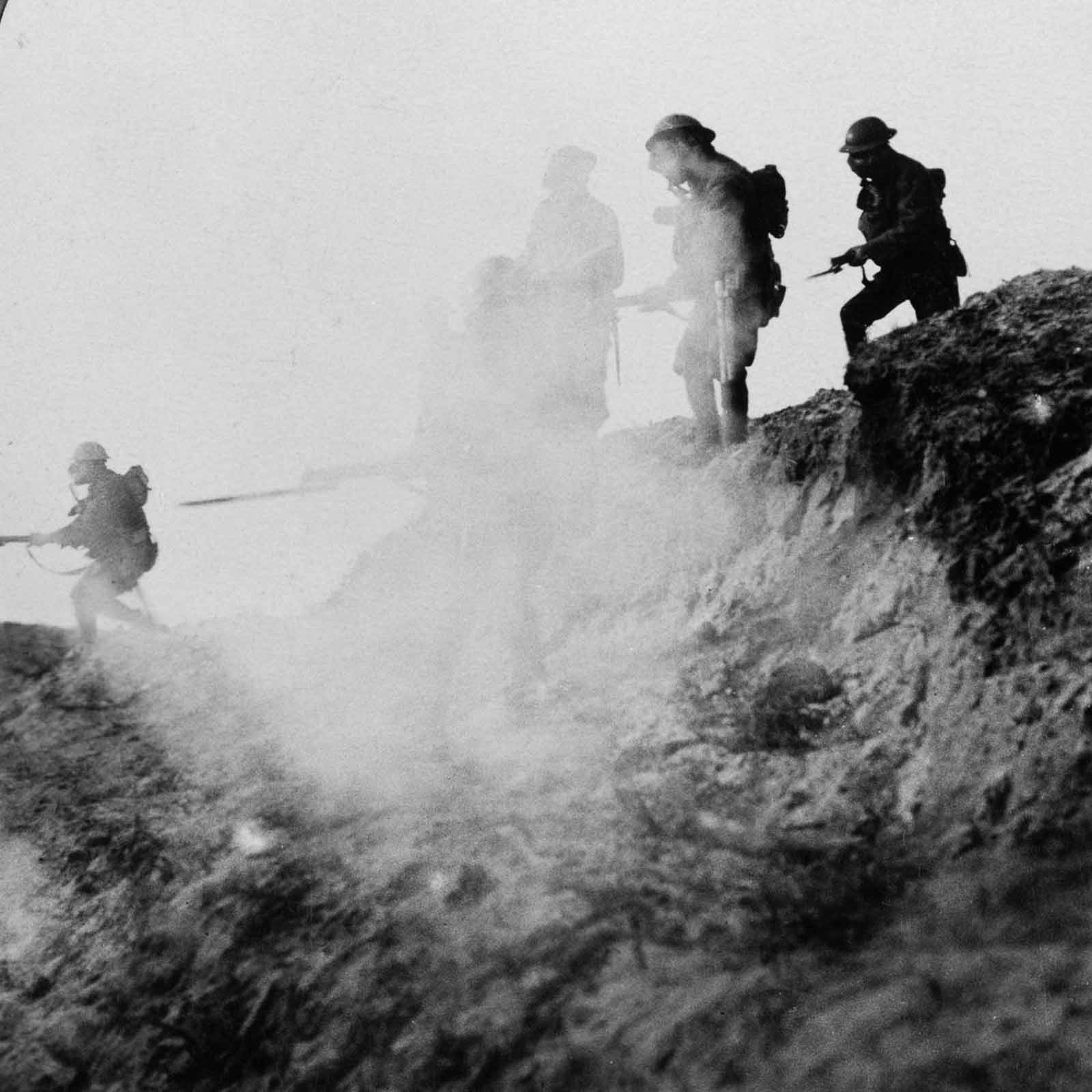 British soldiers advancing under cover of gas and smoke while making a break in the German lines through to Serre and Thiepval. September, 1916.