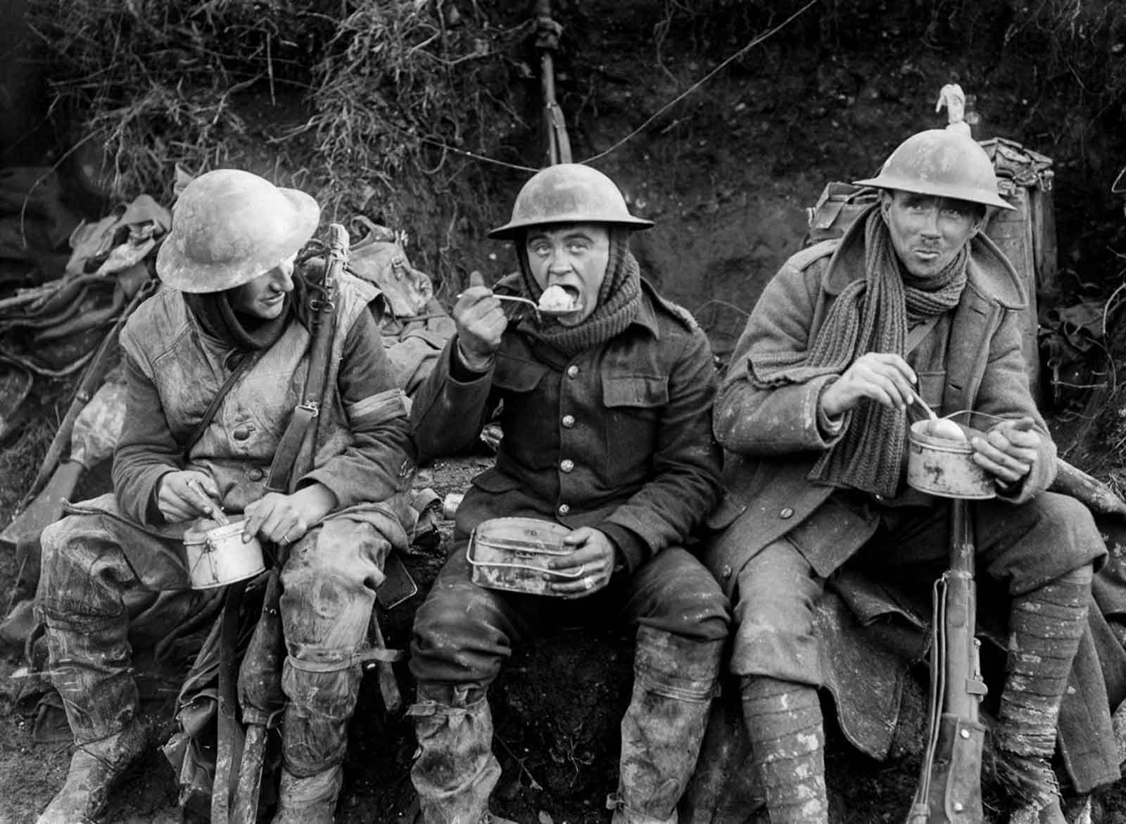 British soldiers eat hot rations in the Ancre Valley. October, 1916.