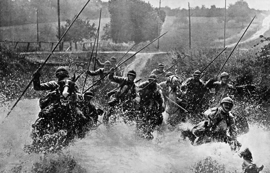 The French cavalry cross a swollen stream on the battle front