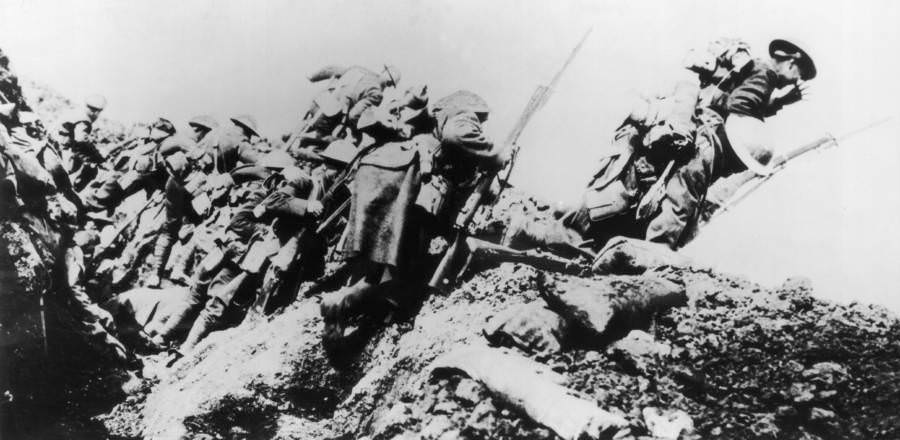 British troops climb from their trench on the first day of the battle.