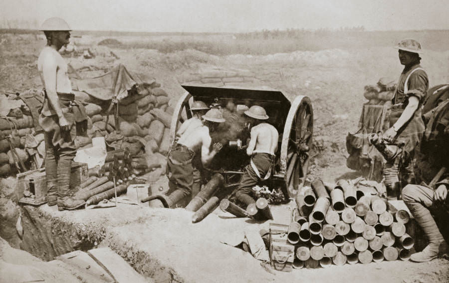 British gunners busily put over a curtain barrage.