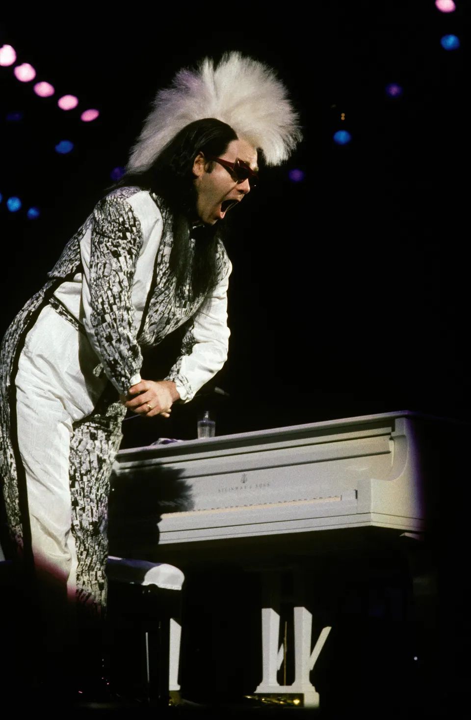 John performing in concert, 1984