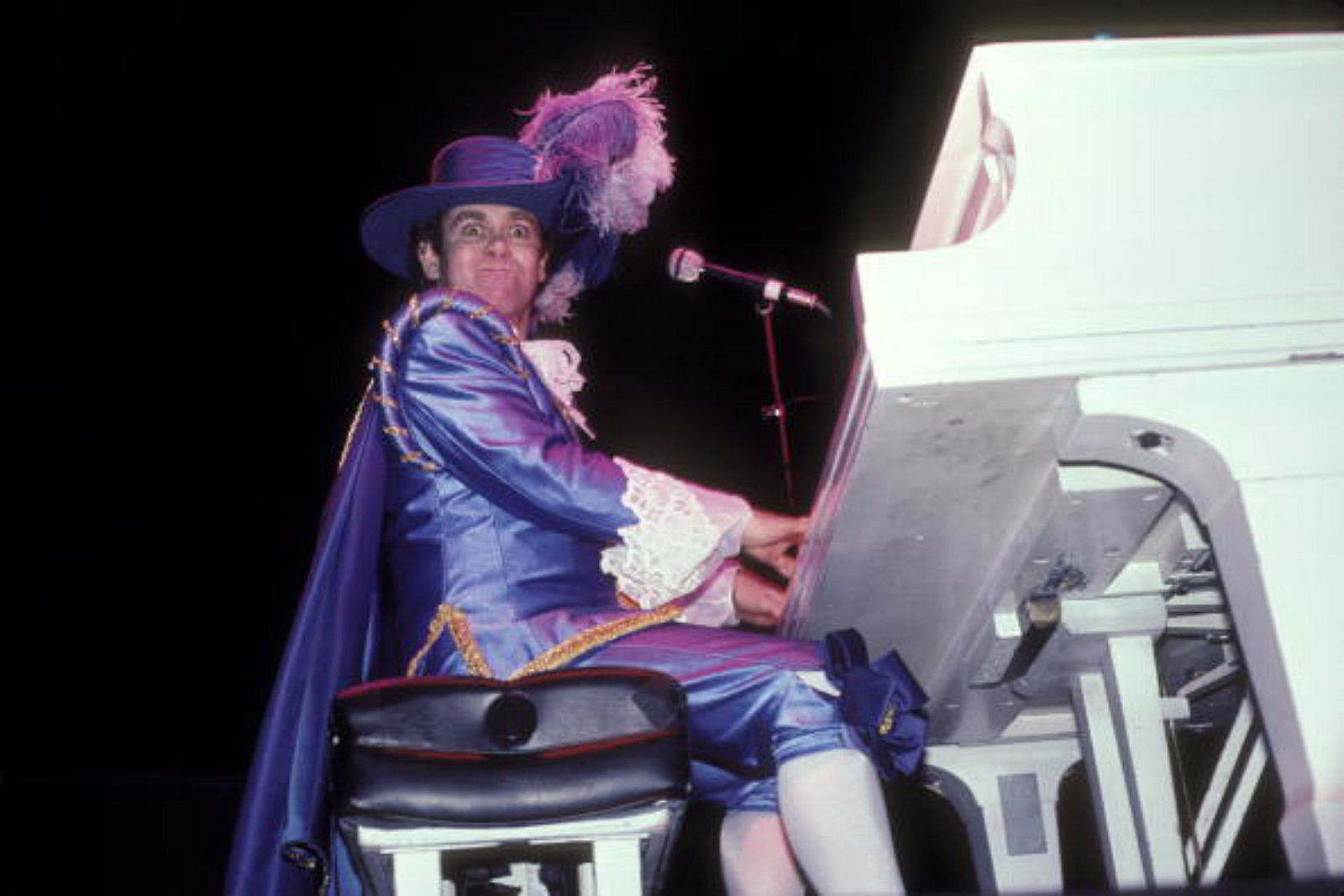 Elton John as Purple musketeer