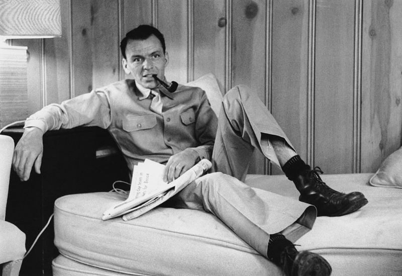 Frank Sinatra smoking a pipe on the set of 'From Here to Eternity,' 1953.