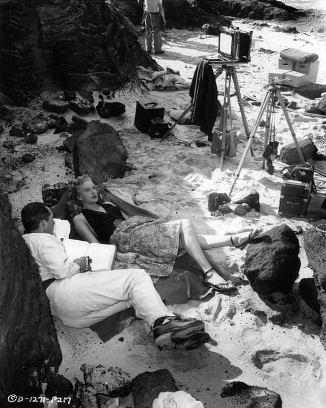 Dialogue director Jus Addiss and Deborah Kerr go over the next scene of the film 'From Here to Eternity,' 1953.