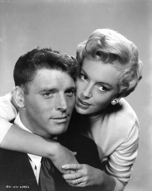 Burt Lancaster embraced by Deborah Kerr in publicity portrait for the film 'From Here to Eternity,' 1953.