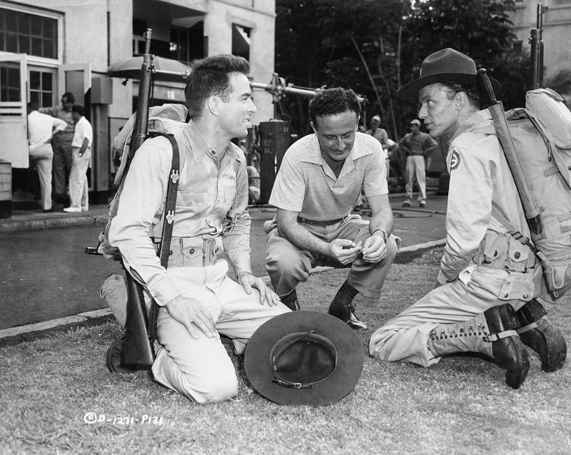 Fred Zinnemann directing Montgomery Clift and Frank Sinatra on the set of the film 'From Here to Eternity,' 1953.