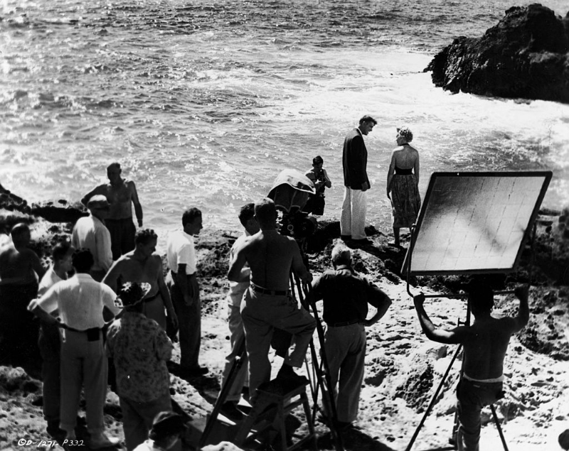 Ernest Borgnine deals with Burt Lancaster under the eyes of Frank Sinatra, Robert J. Wilke and Mickey Shaughnessy in a scene from the film 'From Here to Eternity,' 1953.