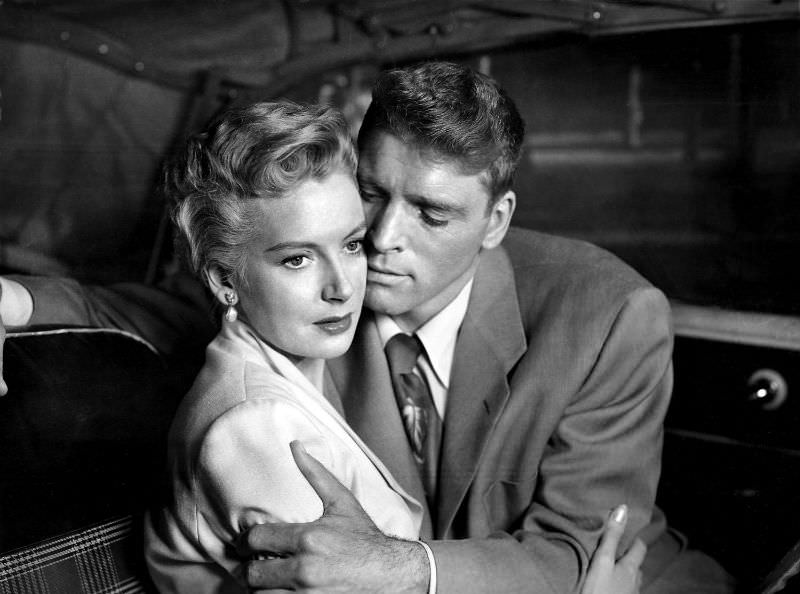 Deborah Kerr and Burt Lancaster get a little closer in a scene from the film 'From Here to Eternity,' 1953.