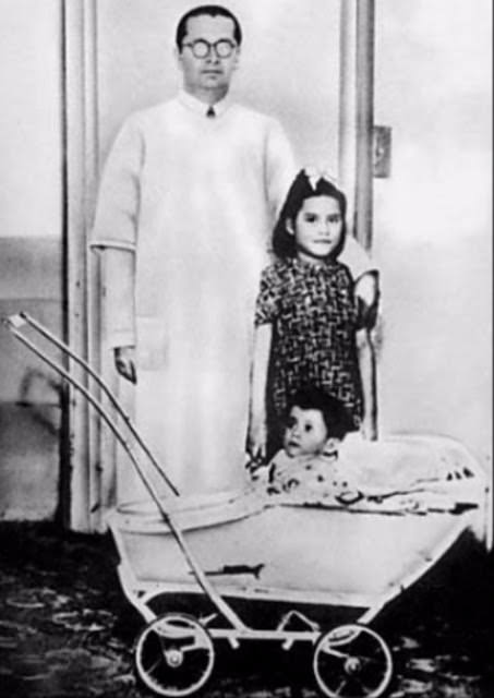 Five-year-old Lina Medina cradles her baby shortly after giving birth in Peru in 1939.