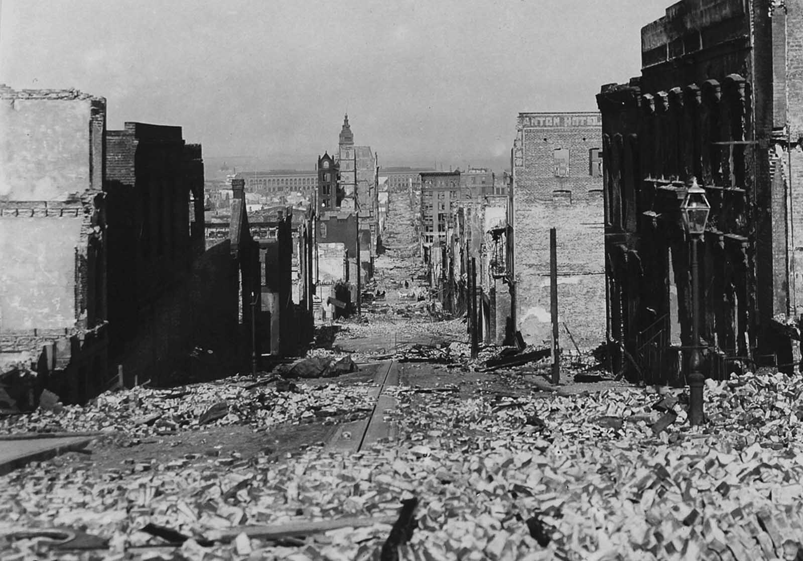 After the disaster, looking down Sacramento Street, from Nob Hill, with the Ferry Building in background.