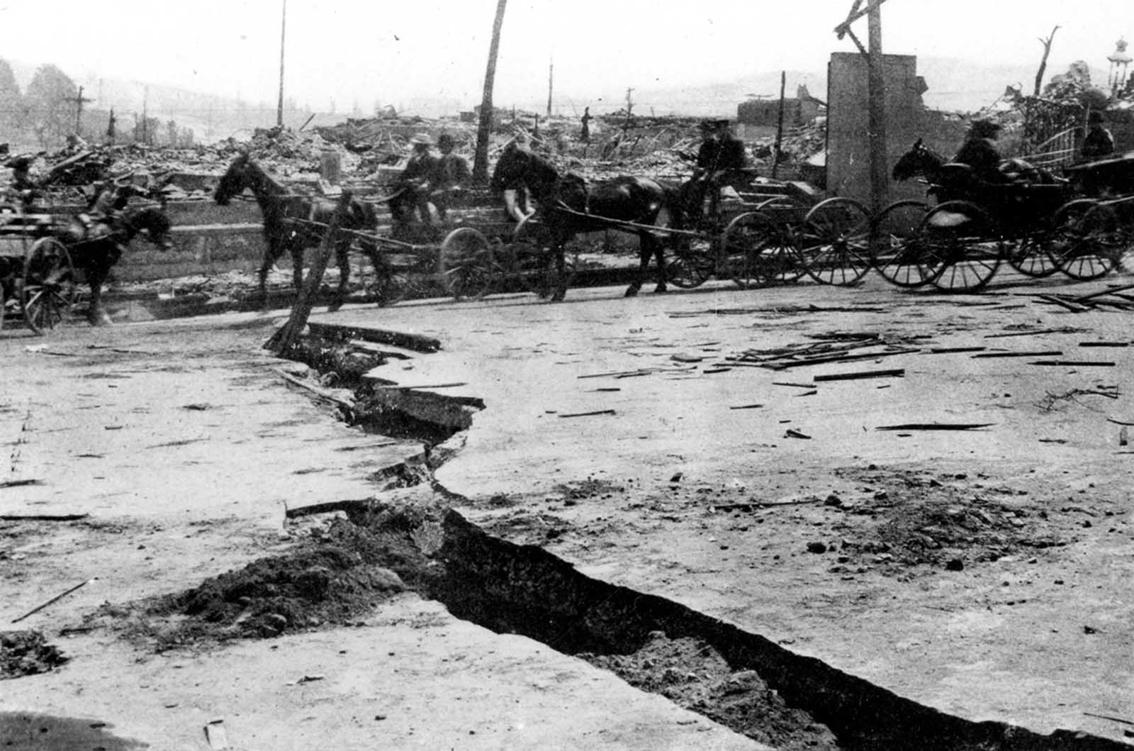 Disruption of Van Ness Avenue over a filled-in ravine. Original caption: “Break in asphalt paving on Van Ness Avenue near Vallejo Street.