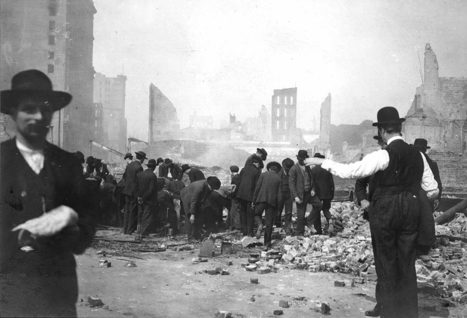 Looting a cash register and destroyed buildings at corner of 4th and Market Streets.