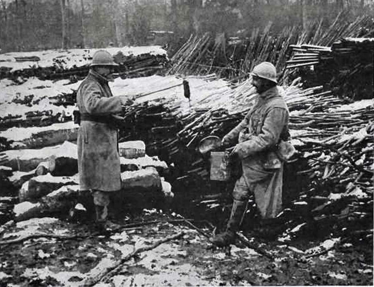 A French soldier showing his “catch” to his comrade.