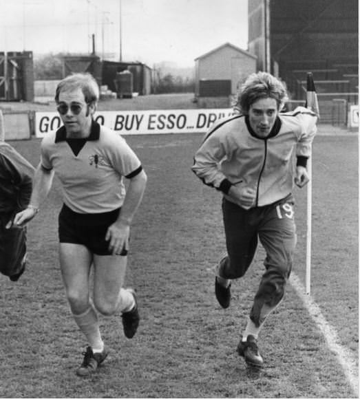 Elton John and Rod Stewart training at Watford FC’s Vicarage Road Stadium, 1973