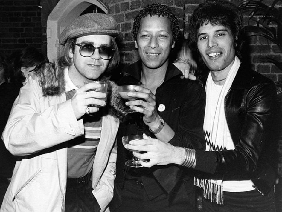 Elton John with Freddie Mercury and Peter Starker, 1977
