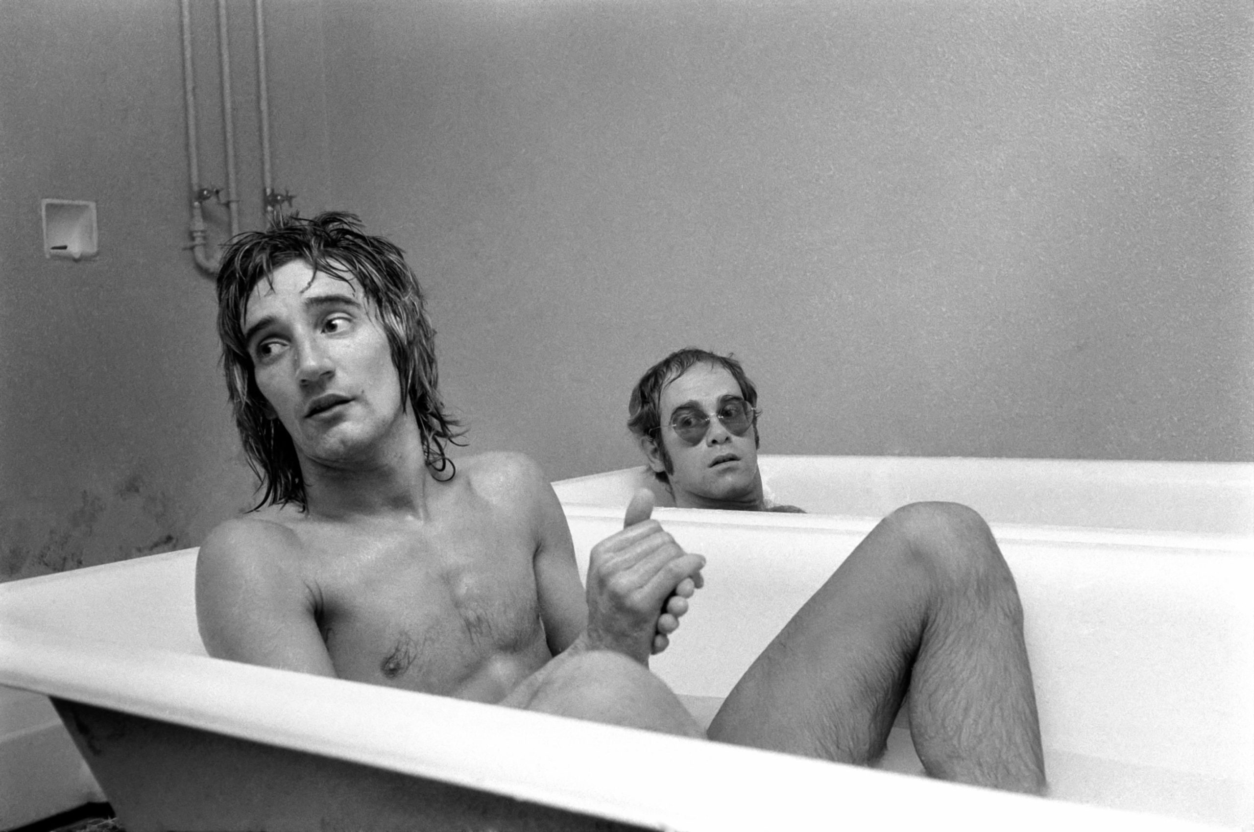 Elton John with Rod Stewart at Watford Football Club, 1972