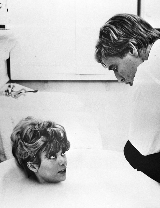 Rita Moreno in a tub chatting with Marlon Brando during the filming of 'The Night of the Following Day,' Lettouquet, France, December 1967.
