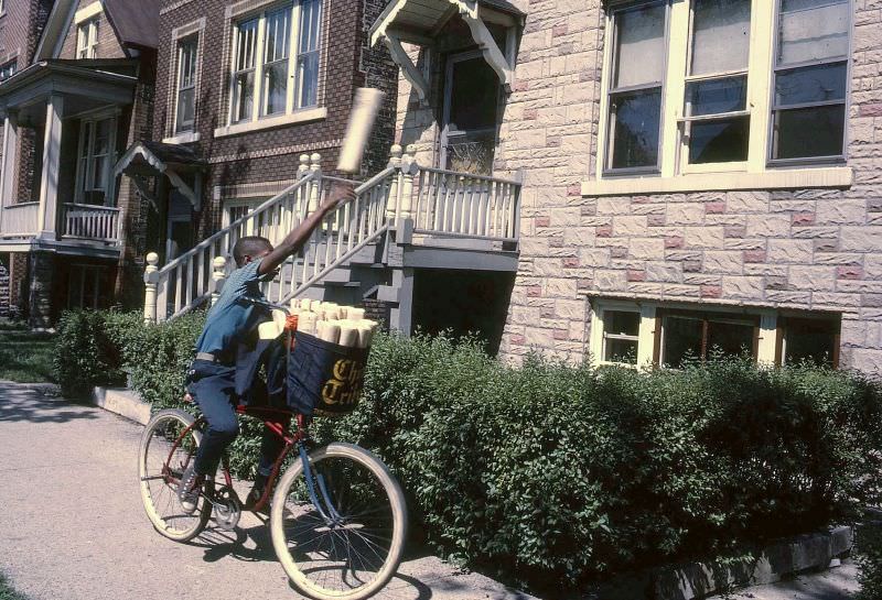 Paperboy delivering of Chicago Tribune, 1967