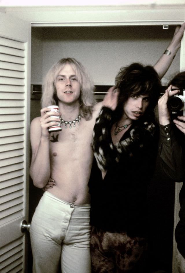 Aerosmith's Steven Tyler and Tom Hamilton pose backstage while in Newport, Rhode Island in 1973