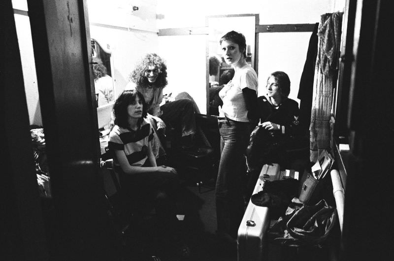 Patti Smith backstage with friends at The Boarding House Nightclub in 1975 in San Francisco, California