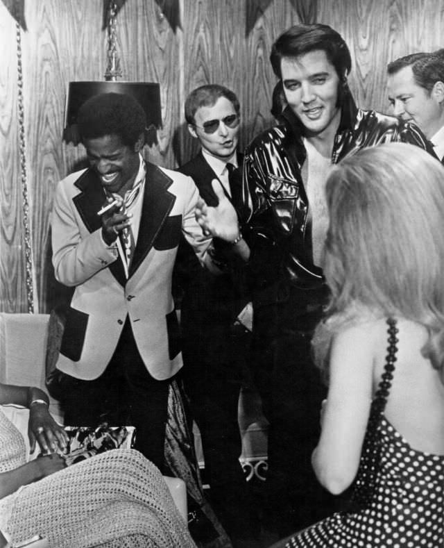 Elvis Presley and Sammy Davis, Jr. backstage in Elvis' dressing room, opening night at the Showroom International Hotel on August 10, 1970 in Las Vegas, Nevada