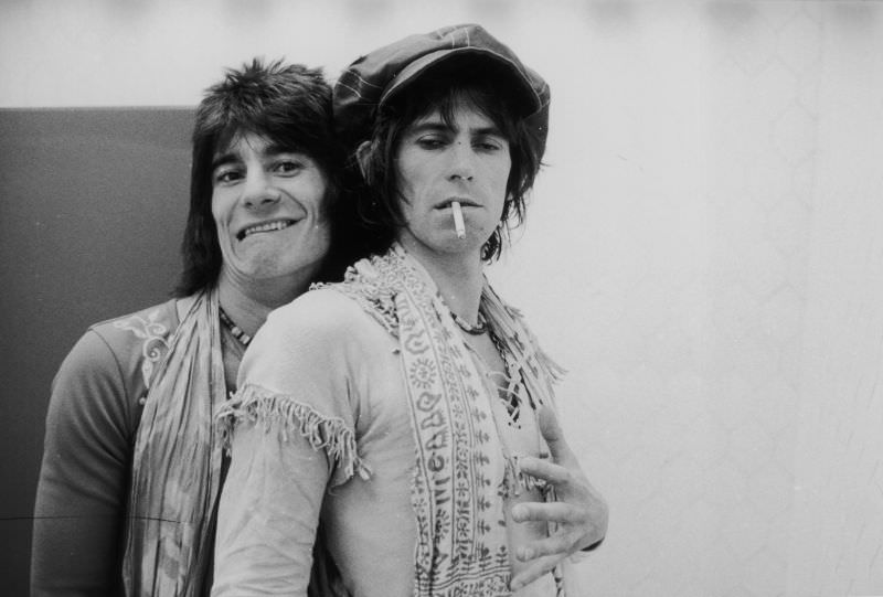 Ron Wood embraces Keith Richards backstage during the Rolling Stones' 1975 Tour of the Americas