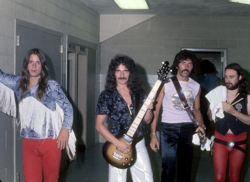 Ozzy Osbourne, Tony Iommi, Geezer Butler and Bill Ward of the heavy metal band Black Sabbath pose for a portrait backstage at Cobo Hall on November 26, 1976 in Detroit, Michigan