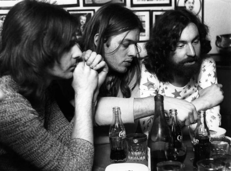 Rick Wright, David Gilmour, and Nick Mason of Pink Floyd backstage in Germany, doing interview on November 14, 1970