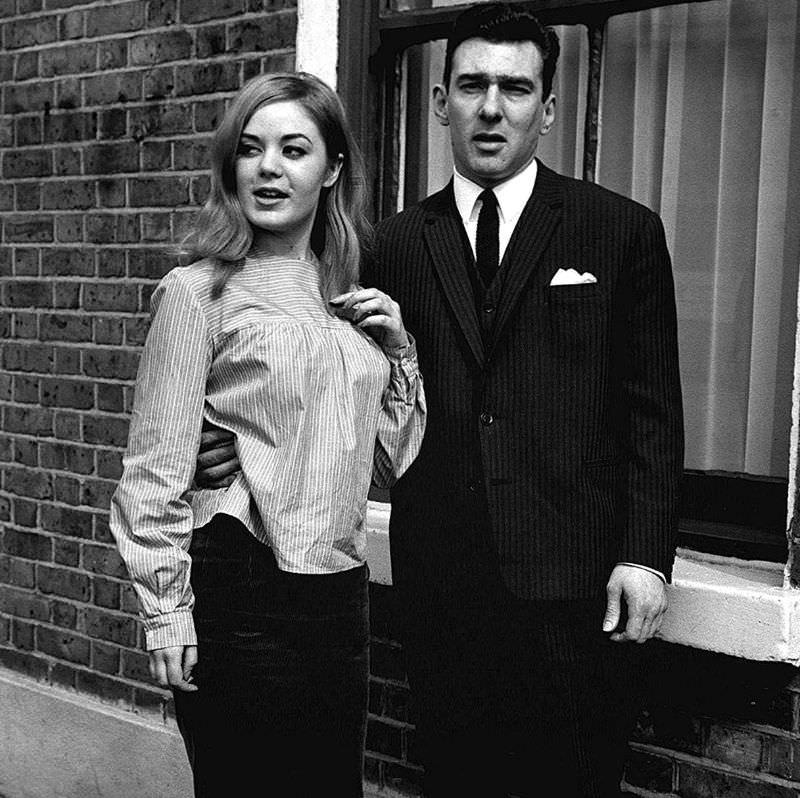 Reggie Kray and Frances Shea outside the Kray home in Valance Road after he and Ronnie are acquitted of all charges of demanding money with menaces, 5th April 1965