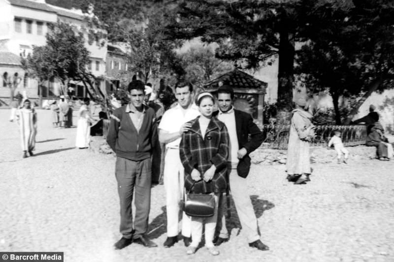 Reg Kray and Francis pose for a group photo with two unknown people, circa 1963, in Tangier, Morocco