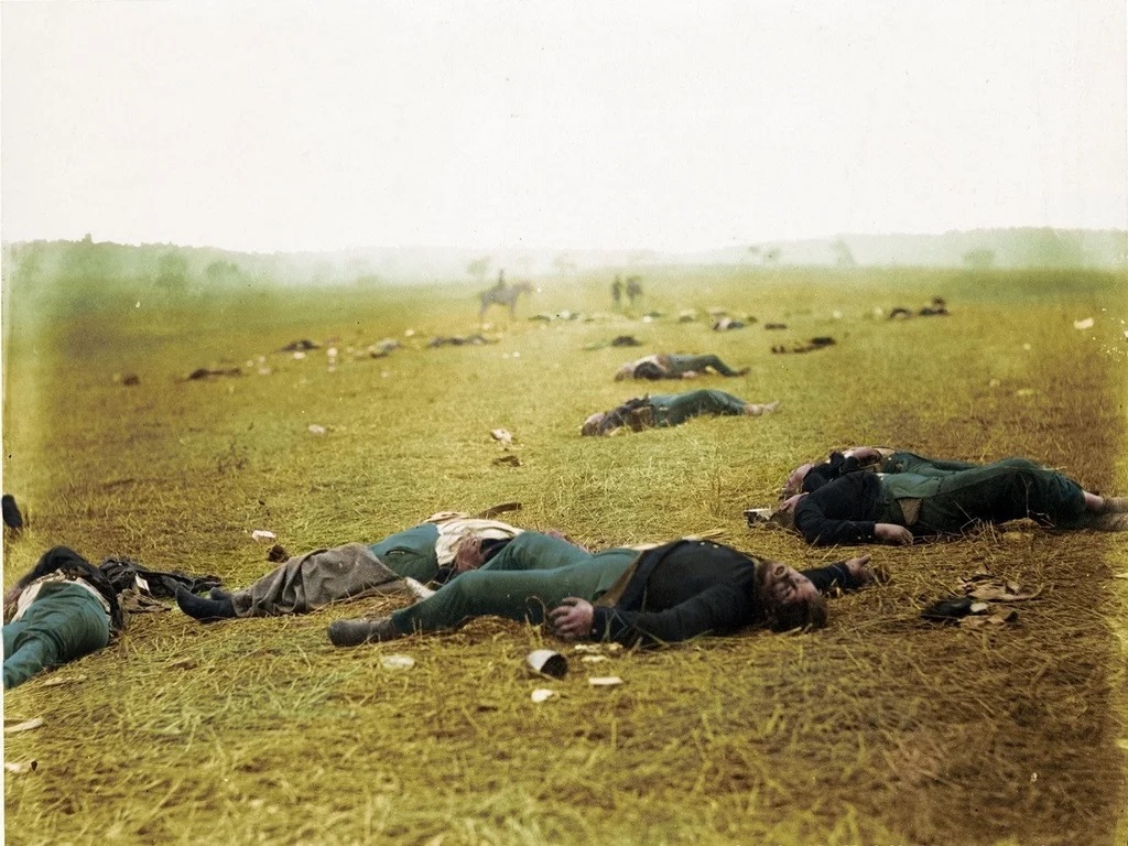 The bodies of several Union soldiers lie on the battlefield. This photo is known as "Harvest of Death."