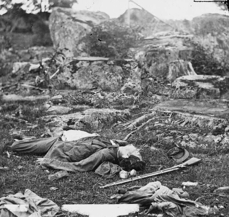 Confederate bodies lie dead in the area known as the "devil's den."