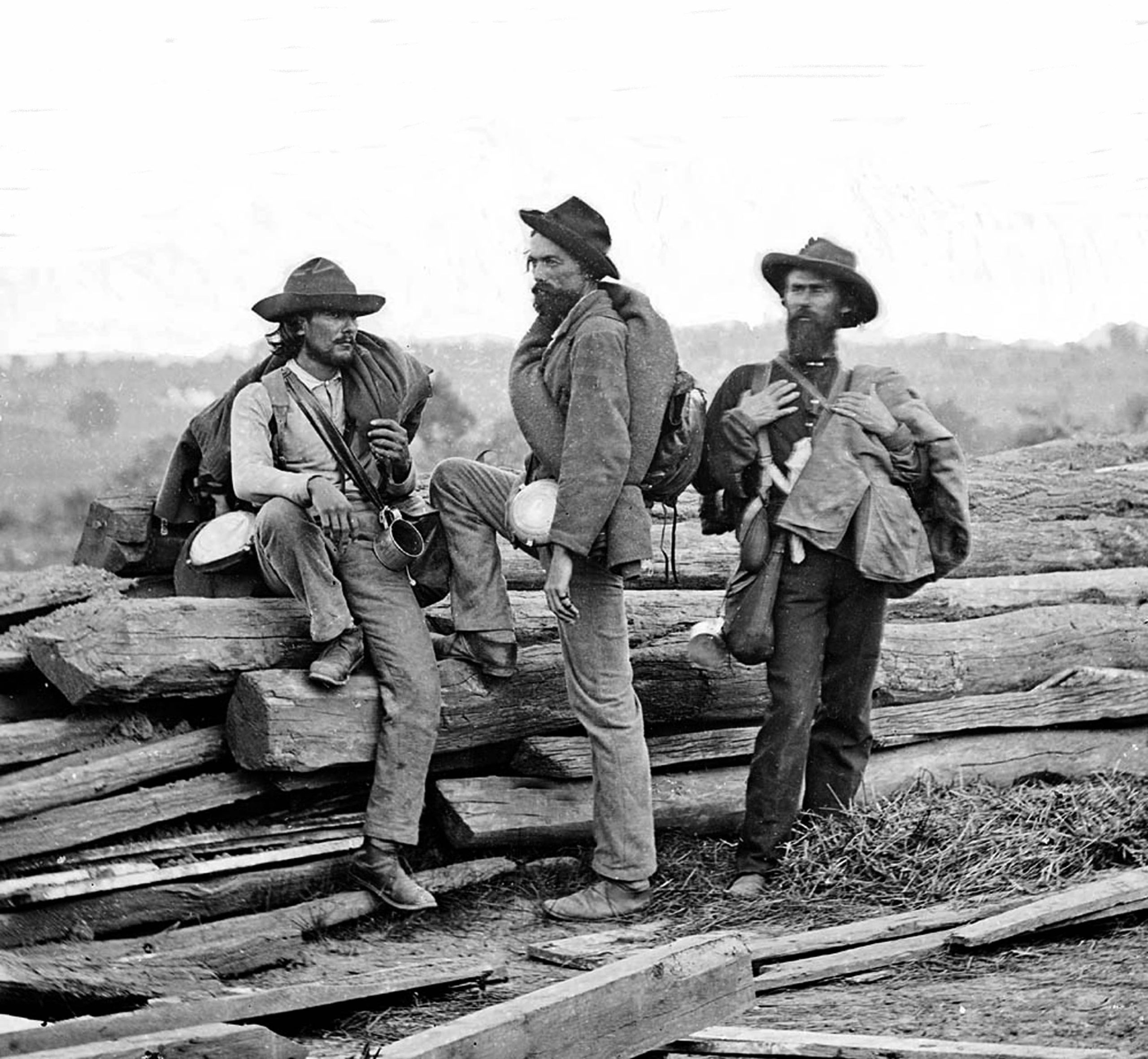 Three Confederate Army prisoners relax after the Battle of Gettysburg, 1863