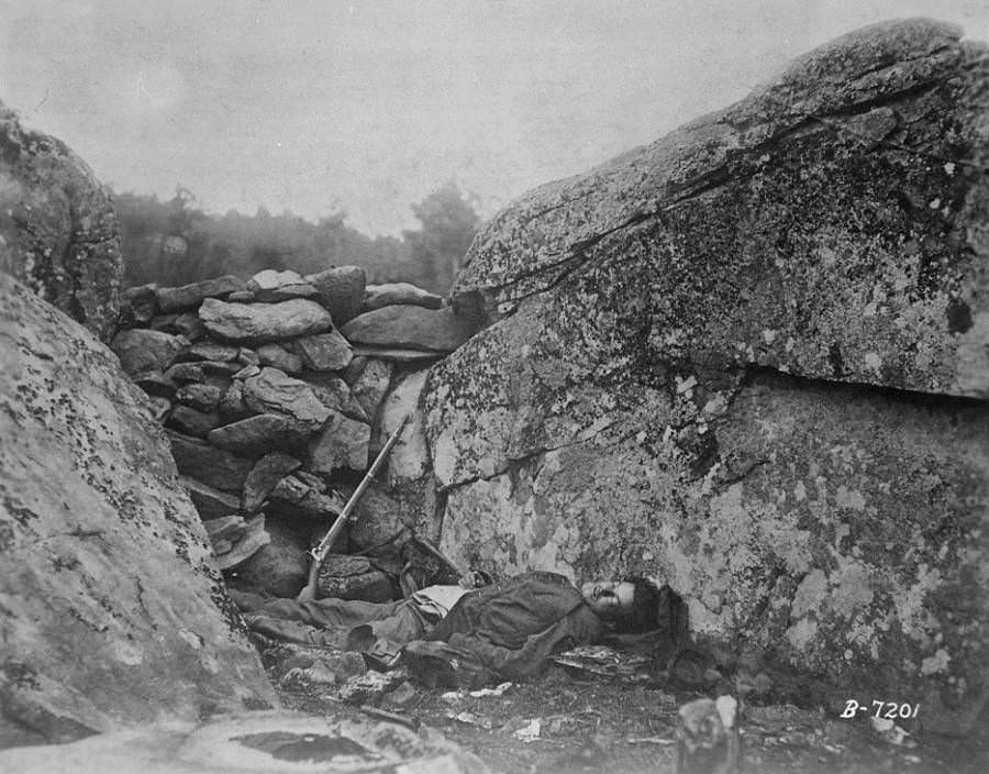 The body of a Confederate sharpshooter is left lying where he was shot.