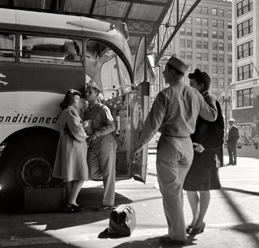 Soldiers with their girls at the Indianapolis bus station, 1943